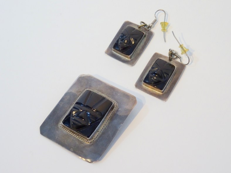 Lee Franclemont (née Pfaff), brooch and earrings set, 1940s, silver and Bakelite. Photo credit Kelise Franclemont.